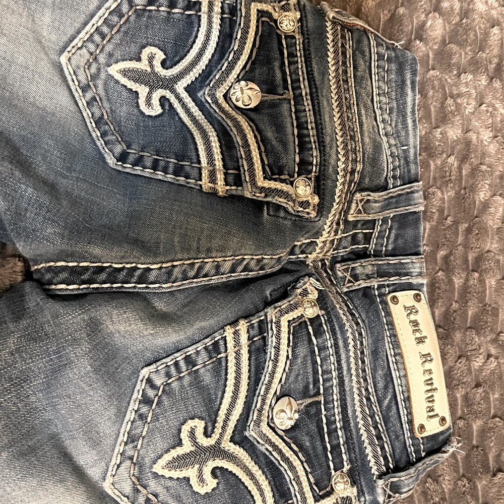 Rock Revival Blue Jeans with Ornate Stitching and Distressed Look
